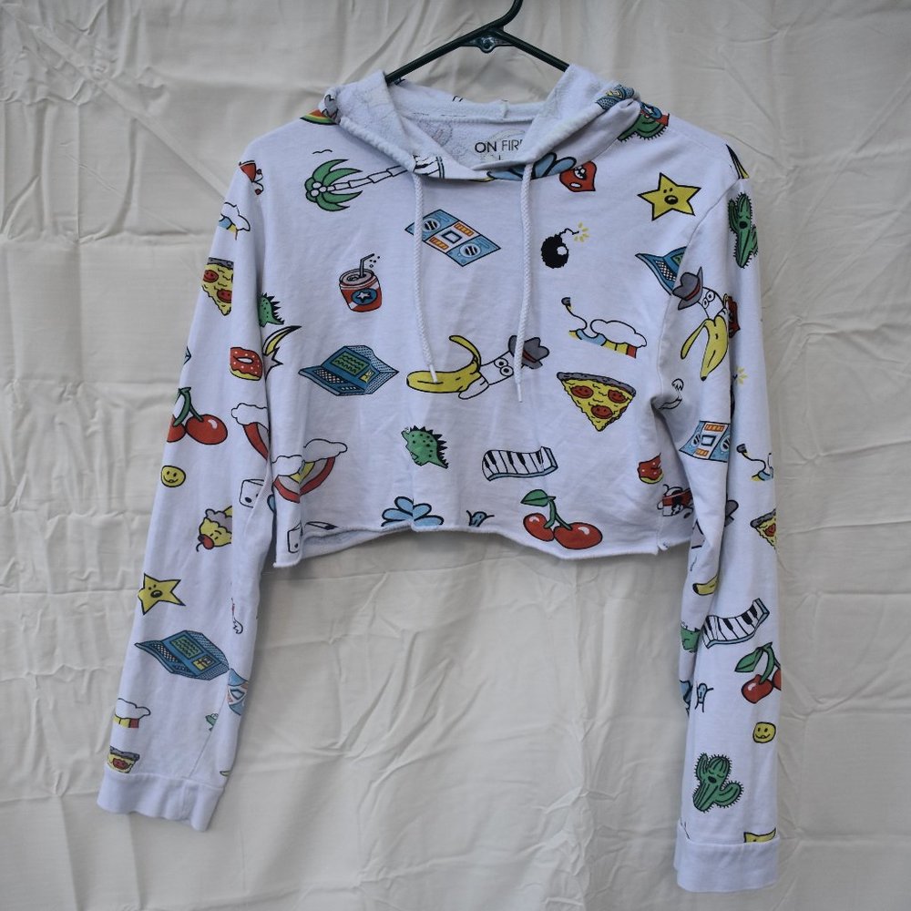 Long sleeve, hooded, "doodle" crop top.